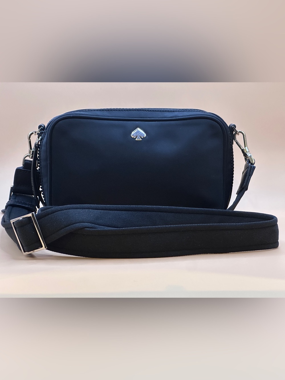 Kate Spade black crossbody bag with gold Spade Logo